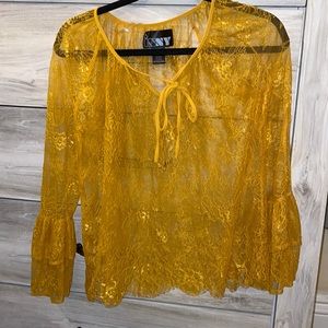 Yellow/orange blouse with ruffle sleeves